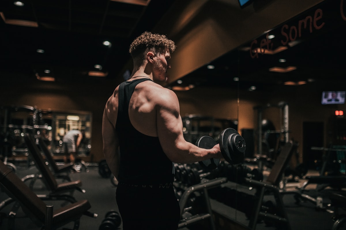Active man staying hydrated during training